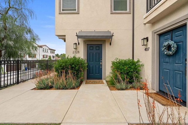 2328 Stardust Gln, Escondido, CA 92025 - entrance to property featuring stucco siding and a patio area