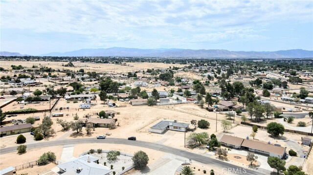 18251 Hiawatha Rd, Apple Valley, CA 92307 - drone / aerial view of a mountainous background and a desert landscape