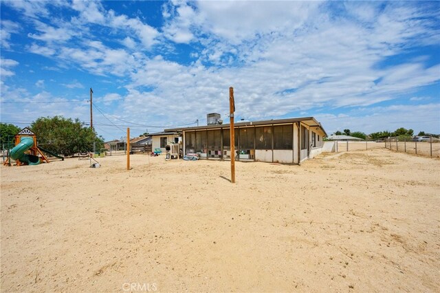 18251 Hiawatha Rd, Apple Valley, CA 92307 - back of house with a sunroom