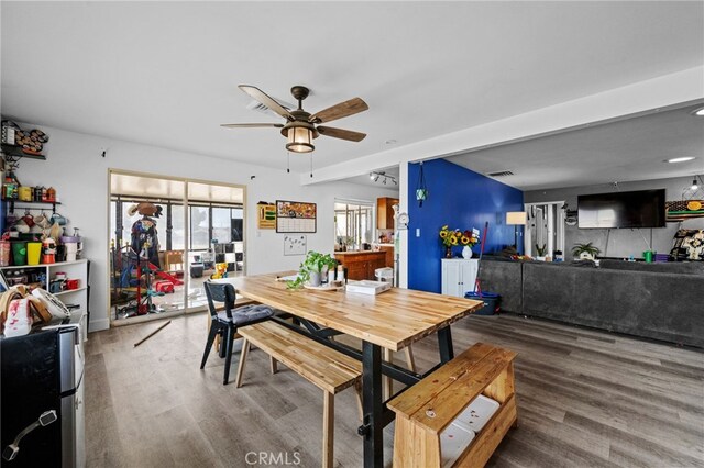 18251 Hiawatha Rd, Apple Valley, CA 92307 - dining room with ceiling fan and wood finished floors