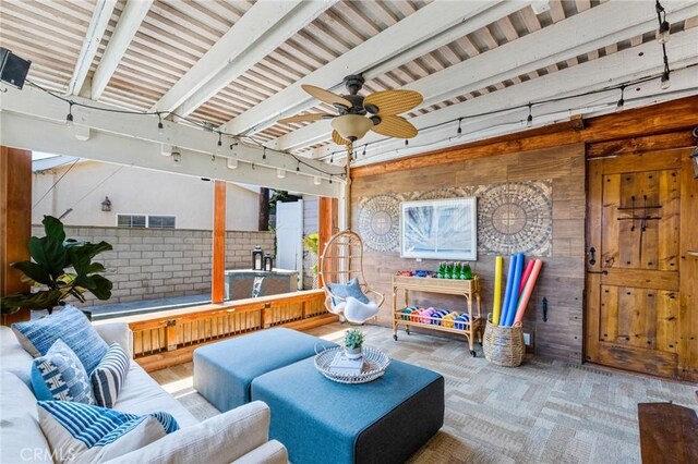 2645 S Patton Ave, San Pedro, CA 90731 - living room featuring wooden walls, ceiling fan, and rail lighting