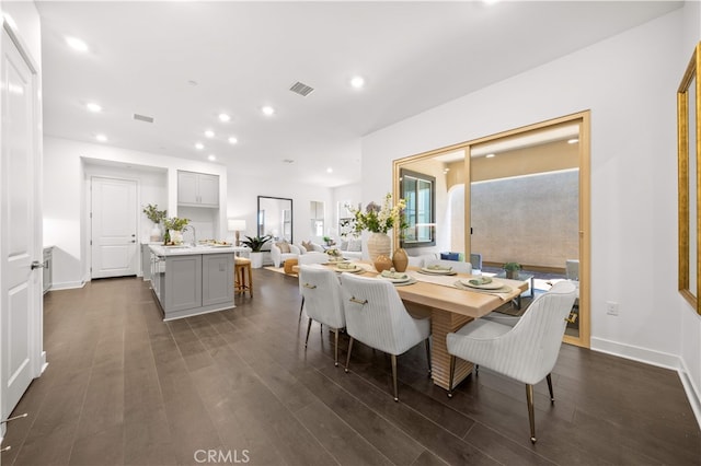 149 Great Park Blvd, Irvine, CA 92618 - dining space featuring dark wood-style flooring, recessed lighting, and baseboards