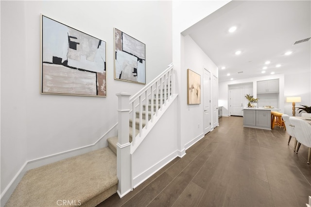 149 Great Park Blvd, Irvine, CA 92618 - stairway featuring recessed lighting, wood finished floors, and baseboards