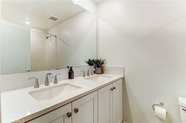 261 Siena, Lake Forest, CA 92630 - full bathroom with double vanity, toilet, and a shower