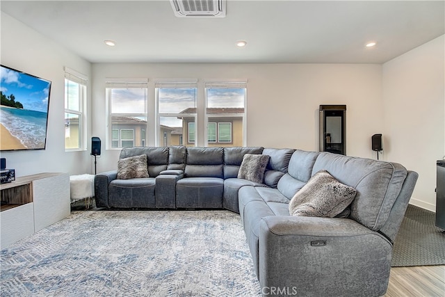 261 Siena, Lake Forest, CA 92630 - living room with plenty of natural light, wood finished floors, and recessed lighting