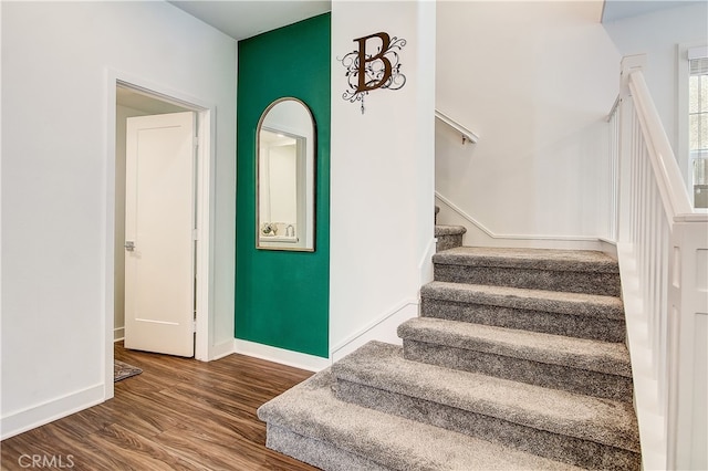 261 Siena, Lake Forest, CA 92630 - staircase featuring wood finished floors and baseboards