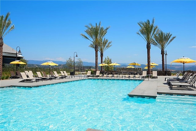 40 Lomada St, Rancho Mission Viejo, CA 92694 - community pool with a mountain view and a patio area