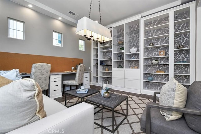 23942 Schoenborn St, West Hills, CA 91304 - living area featuring wood finished floors, healthy amount of natural light, built in features, and recessed lighting