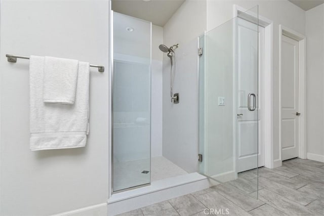 23942 Schoenborn St, West Hills, CA 91304 - bathroom with a stall shower and baseboards