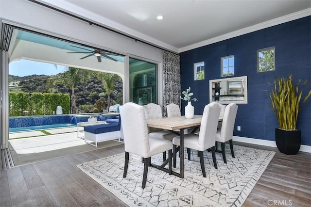 23942 Schoenborn St, West Hills, CA 91304 - dining space with crown molding, wood finished floors, a ceiling fan, recessed lighting, and baseboards