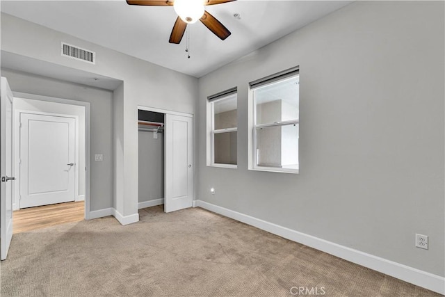 300 E 4th St Unit 204, Long Beach, CA 90802 - unfurnished bedroom featuring carpet, baseboards, a closet, and ceiling fan