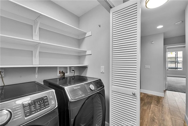 300 E 4th St Unit 204, Long Beach, CA 90802 - laundry room with separate washer and dryer, wood finished floors, baseboards, and recessed lighting