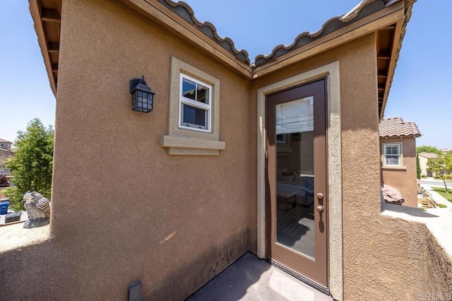 1686 Pember Ave, Chula Vista, CA 91913 - property entrance with stucco siding