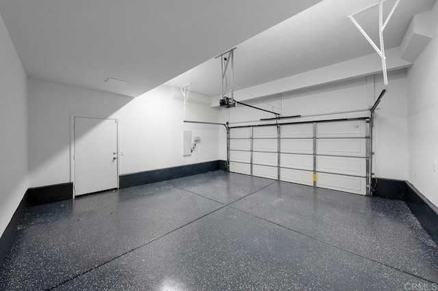 1686 Pember Ave, Chula Vista, CA 91913 - garage featuring a garage door opener and electric panel