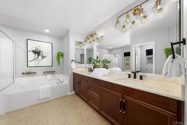 1686 Pember Ave, Chula Vista, CA 91913 - full bathroom featuring a bath, double vanity, a shower stall, tile patterned floors, and recessed lighting