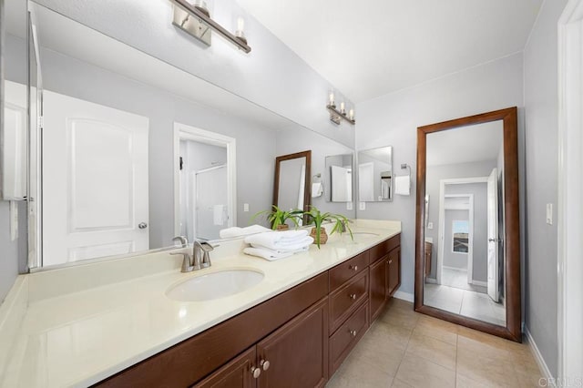 1686 Pember Ave, Chula Vista, CA 91913 - full bath featuring double vanity and tile patterned floors
