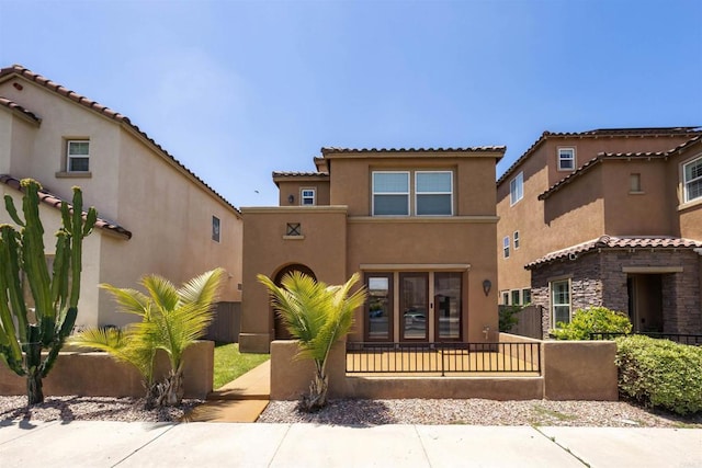 1686 Pember Ave, Chula Vista, CA 91913 - rear view of house with stucco siding and a tiled roof