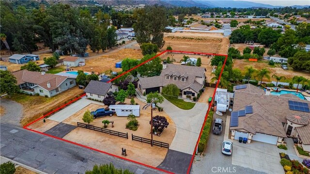 32811 Wesley St, Wildomar, CA 92595 - aerial view of residential area featuring property parcel outlined and mountains