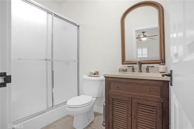 32811 Wesley St, Wildomar, CA 92595 - full bathroom with toilet, a stall shower, vanity, tile patterned flooring, and ceiling fan