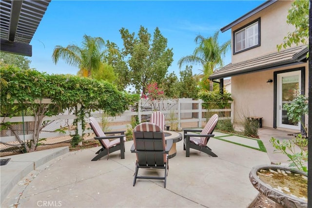 32811 Wesley St, Wildomar, CA 92595 - fenced backyard featuring a fire pit and a patio area