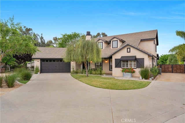 32811 Wesley St, Wildomar, CA 92595 - view of front of house featuring driveway, stucco siding, a chimney, an attached garage, and a tiled roof