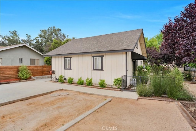 32811 Wesley St, Wildomar, CA 92595 - exterior space with a shingled roof, board and batten siding, and a patio