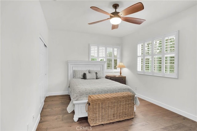 32811 Wesley St, Wildomar, CA 92595 - bedroom with baseboards, wood finished floors, a ceiling fan, and a closet