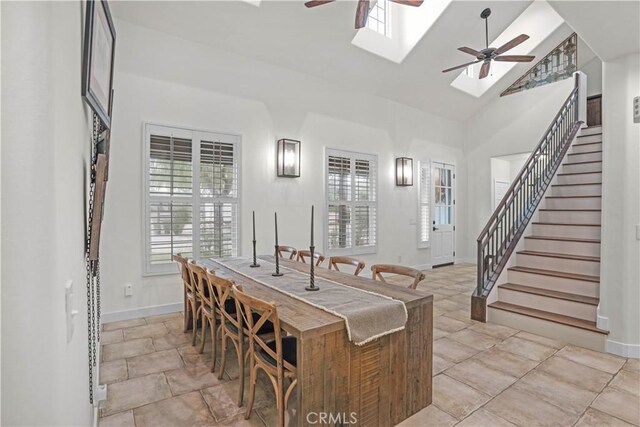 32811 Wesley St, Wildomar, CA 92595 - dining area with a ceiling fan, healthy amount of natural light, stairway, baseboards, and high vaulted ceiling