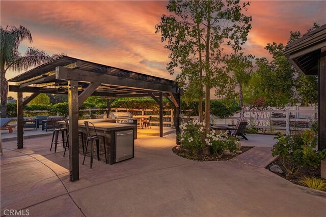 32811 Wesley St, Wildomar, CA 92595 - patio terrace at dusk with a patio and grilling area