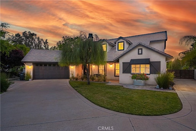 32811 Wesley St, Wildomar, CA 92595 - view of front of property featuring stucco siding, driveway, an attached garage, and a chimney