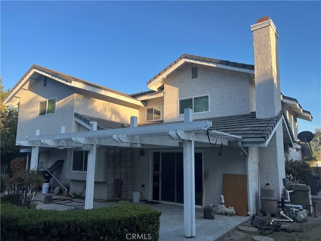 1035 English Oaks Dr, Arcadia, CA 91006 - rear view of house with a chimney, stucco siding, a patio, and a pergola