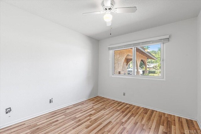1105 Via Prado, Fallbrook, CA 92028 - spare room with light wood finished floors, baseboards, and a ceiling fan