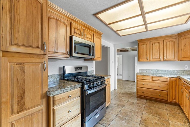 1105 Via Prado, Fallbrook, CA 92028 - kitchen with appliances with stainless steel finishes and tile countertops