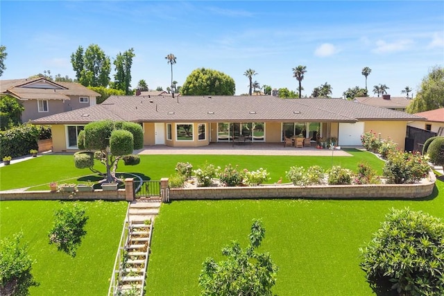 1020 S Montezuma Way, West Covina, CA 91791 - rear view of property with a patio, a yard, and stucco siding