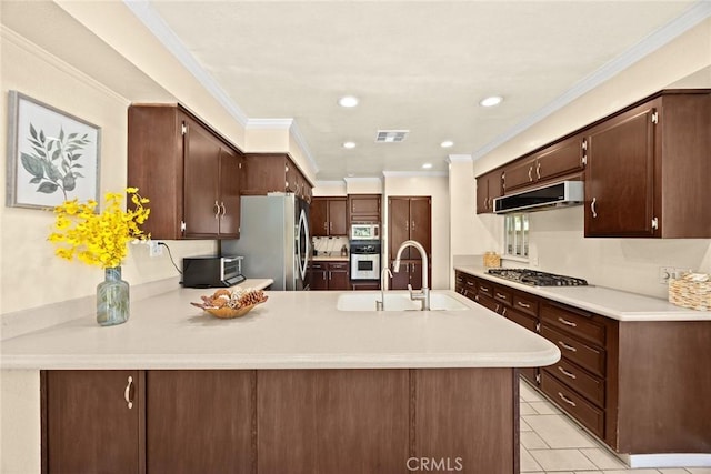 1020 S Montezuma Way, West Covina, CA 91791 - kitchen featuring stainless steel appliances, ventilation hood, light countertops, a peninsula, and ornamental molding