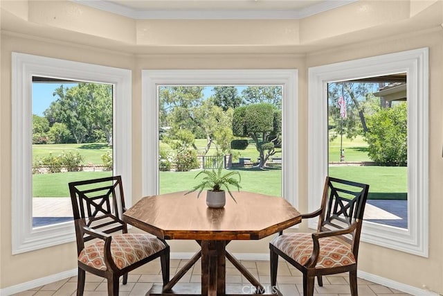 1020 S Montezuma Way, West Covina, CA 91791 - dining area with healthy amount of natural light, light tile patterned flooring, and crown molding