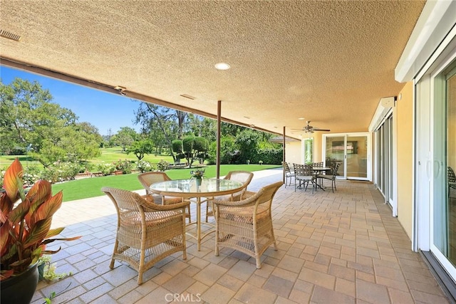 1020 S Montezuma Way, West Covina, CA 91791 - view of patio / terrace with outdoor dining space, view of golf course, and ceiling fan