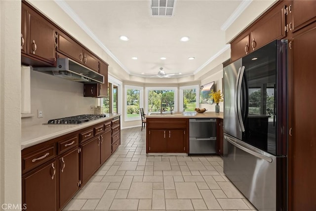 1020 S Montezuma Way, West Covina, CA 91791 - kitchen featuring stainless steel appliances, light countertops, ornamental molding, ceiling fan, and recessed lighting