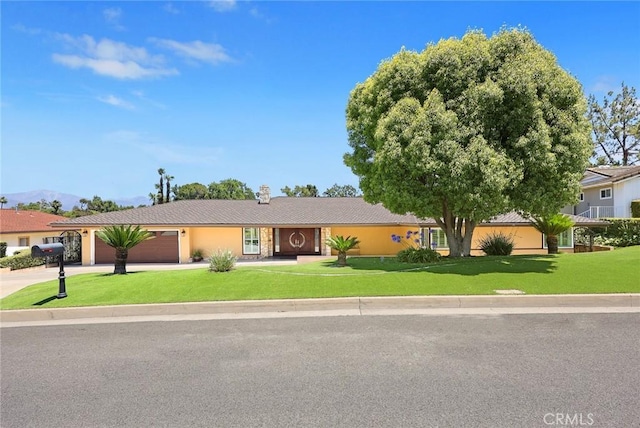 1020 S Montezuma Way, West Covina, CA 91791 - single story home with a garage, driveway, and a front lawn