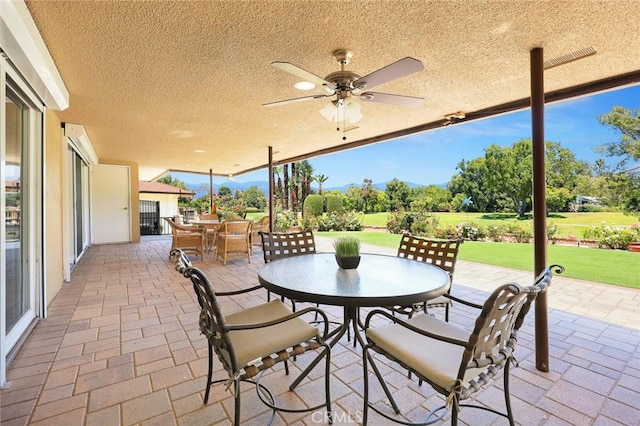 1020 S Montezuma Way, West Covina, CA 91791 - view of patio featuring outdoor dining area, ceiling fan, and view of golf course