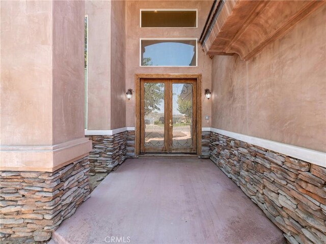 26775 Lakeview, Helendale, CA 92342 - property entrance with stone siding, french doors, and stucco siding