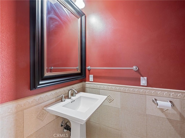 26775 Lakeview, Helendale, CA 92342 - bathroom with a wainscoted wall, tile walls, and a sink