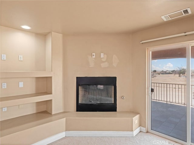 26775 Lakeview, Helendale, CA 92342 - detailed view of carpet flooring, a glass covered fireplace, baseboards, and recessed lighting