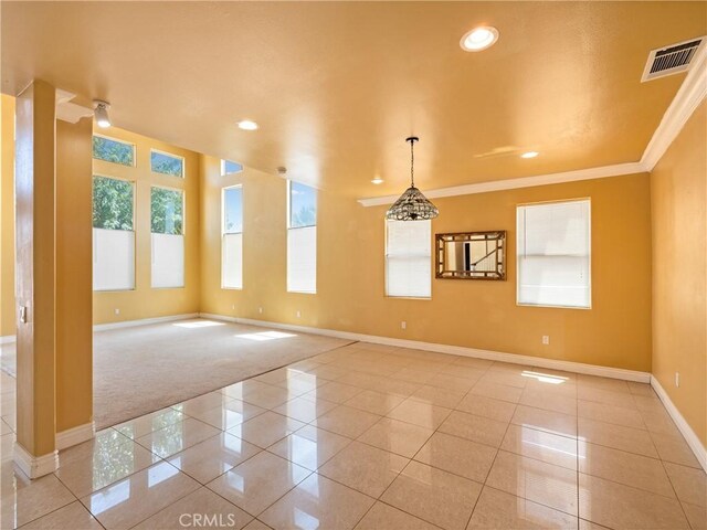 26775 Lakeview, Helendale, CA 92342 - spare room with baseboards, light tile patterned floors, ornamental molding, recessed lighting, and light carpet