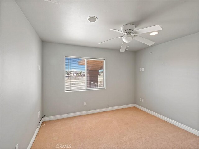 26775 Lakeview, Helendale, CA 92342 - spare room featuring light carpet, baseboards, a ceiling fan, and recessed lighting
