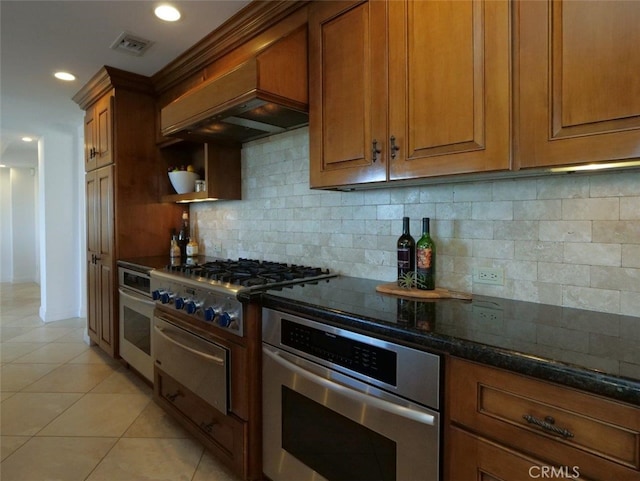 3226 Corinna Dr, Rancho Palos Verdes, CA 90275 - kitchen with stainless steel oven, a warming drawer, wall oven, light tile patterned flooring, and stovetop