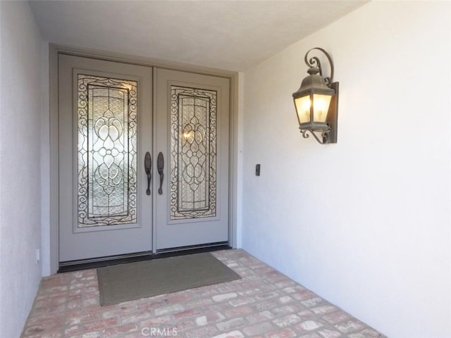 3226 Corinna Dr, Rancho Palos Verdes, CA 90275 - property entrance with french doors and stucco siding