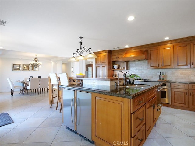 3226 Corinna Dr, Rancho Palos Verdes, CA 90275 - kitchen with stainless steel oven, a chandelier, built in fridge, brown cabinetry, and recessed lighting