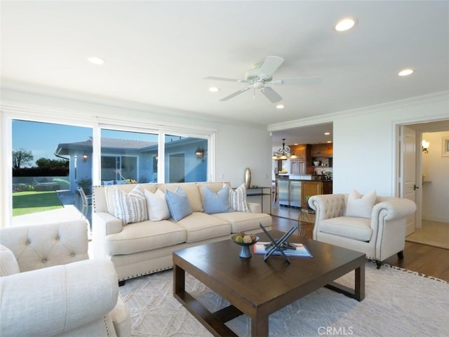 3226 Corinna Dr, Rancho Palos Verdes, CA 90275 - living area featuring recessed lighting, ceiling fan, light wood-type flooring, ornamental molding, and healthy amount of natural light