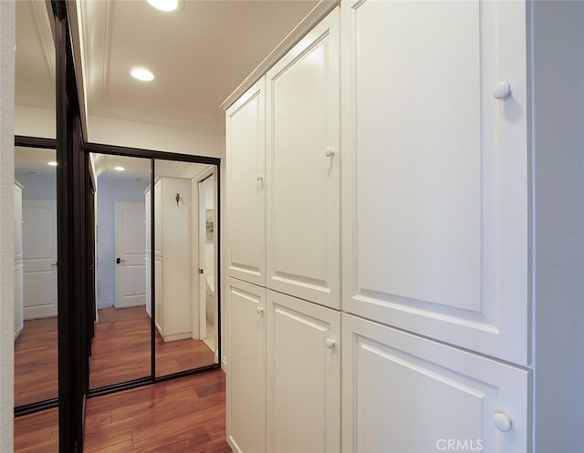 3226 Corinna Dr, Rancho Palos Verdes, CA 90275 - corridor featuring ornamental molding, dark wood-style flooring, and recessed lighting